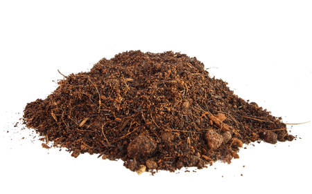Pile of soil isolated on white の写真素材