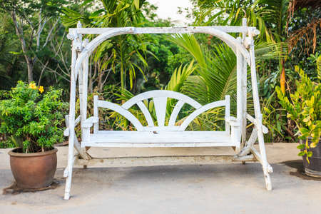 Wooden white Swingの写真素材