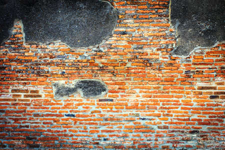 Old red brick wall in Wat Mahathat in the Ayutthaya Historical Park, Ayutthaya, Thailand.の写真素材