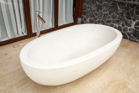 White bathtub made of terrazzoの写真素材