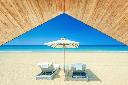 Wood ceiling with sunbed at the beachの写真素材