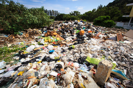 Pile of domestic garbage in landfillの写真素材