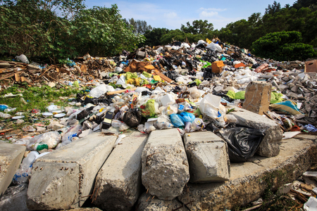 Pile of domestic garbage in landfillの写真素材