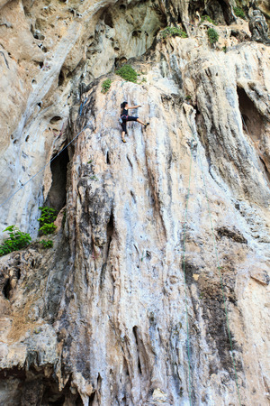 Climbing extream sport in Railay beach, Krabi Thailandの写真素材