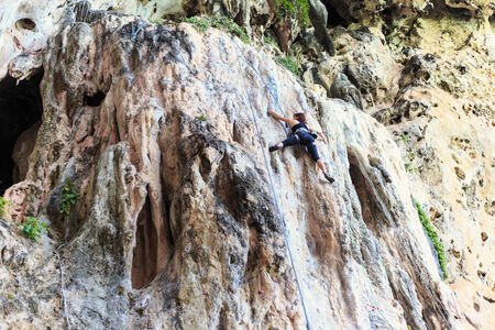 Climbing extream sport in Railay beach, Krabi Thailandの写真素材