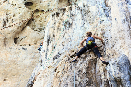 Climbing extream sport in Railay beach, Krabi Thailandの写真素材