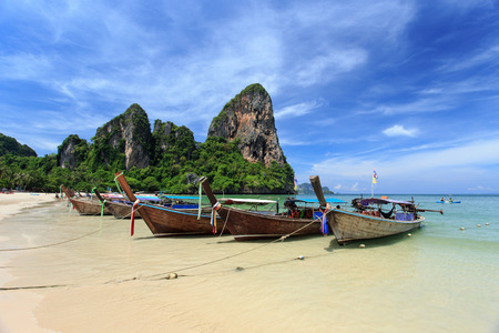 Traditional Thai boat, Long tail stand in the sea at Railay beach, Krabi, Thailandの写真素材
