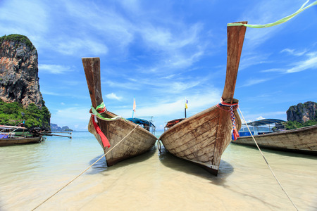 Traditional Thai boat, Long tail stand in the sea at Railay beach, Krabi, Thailandの写真素材