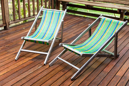sun loungers stand on the terraceの写真素材