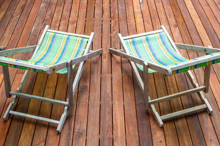 sun loungers stand on the terraceの写真素材
