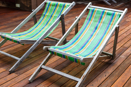 sun loungers stand on the terraceの写真素材