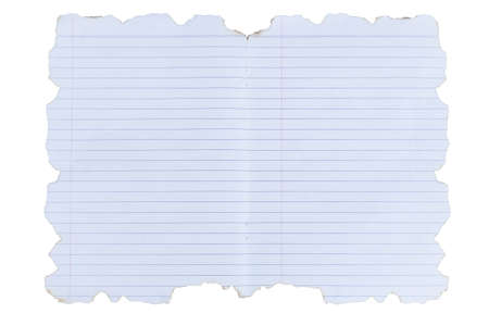 Lined paper with burned edgesの写真素材