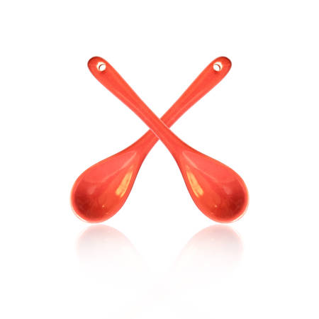 Ceramic spoon isolated on white backgroundの写真素材