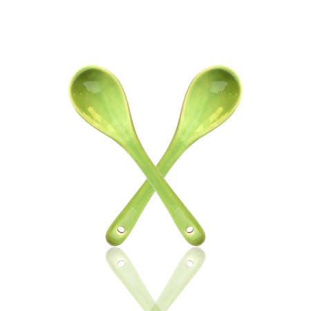 Ceramic spoon isolated on white backgroundの写真素材