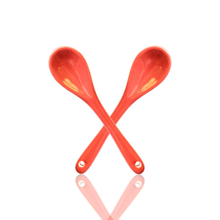Ceramic spoon isolated on white backgroundの写真素材