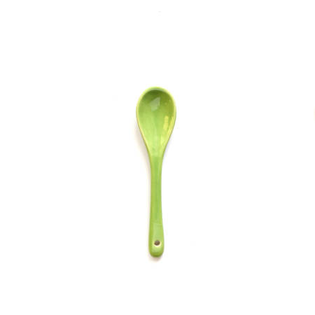 Ceramic spoon isolated on white backgroundの写真素材