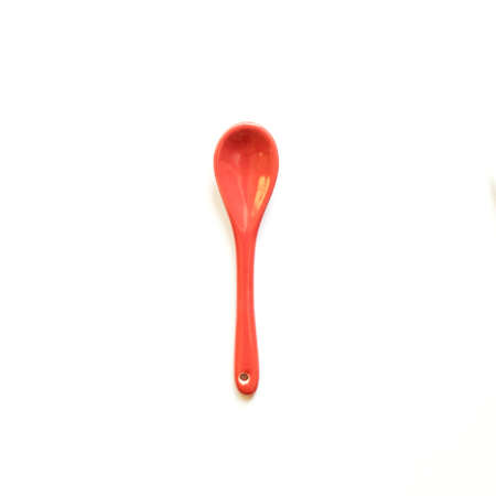 Ceramic spoon isolated on white backgroundの写真素材