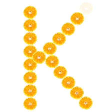 Half of orange isolated on white backgroundの写真素材