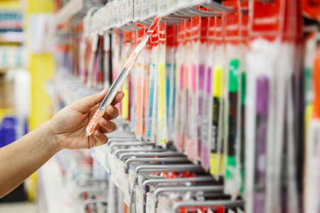 Close up woman shopping in department storeの写真素材