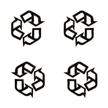 Black recycle symbol on cardboardの写真素材