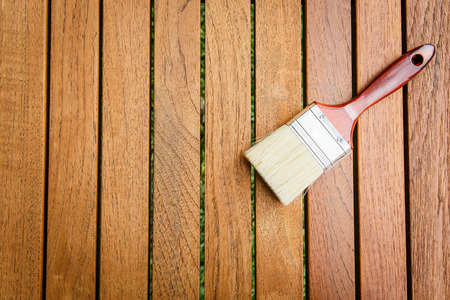 Paint brush on wooden tableの写真素材