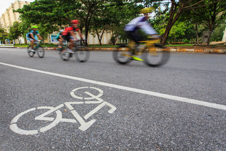 Bicycle sign or icon and movement  of cyclist in the parkの写真素材