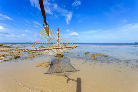 hammock between on tropical beach in Koh Samuiの写真素材