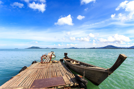 Traditional Thai boat, Long tail stand in the sea at Phuket, Thailandの写真素材