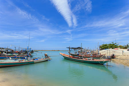 Traditional Thai boat or long tail boat stand at the beachの写真素材
