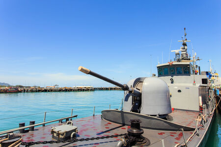 SURATTHANI - JULY 16 : A Thailand Battleship stand at Nathon pier in Koh Samui stand by after National Council for Peace and Order take control of Thailand on July 16, 2014 in Suratthani, Thailand.のeditorial素材