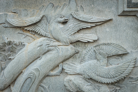 Close up granite carving in chinese templeの写真素材