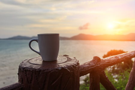 Coffee cup and sutsetの写真素材