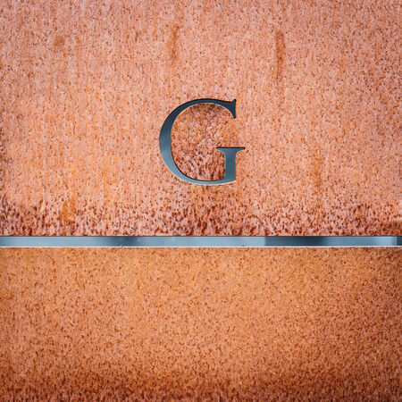 Rusty on white metal sheetの写真素材