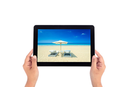 Hand holding tabletの写真素材