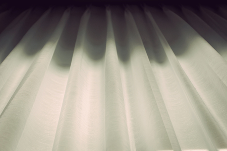 White curtain beside windowの写真素材