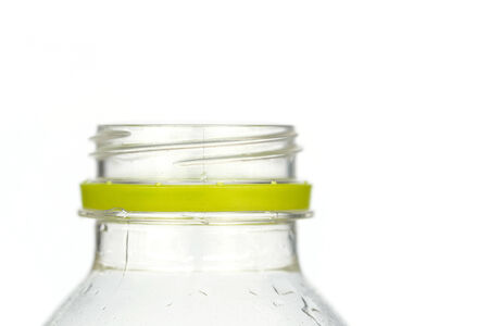 Close up plastic bottle without cap isolated on white backgroundの写真素材