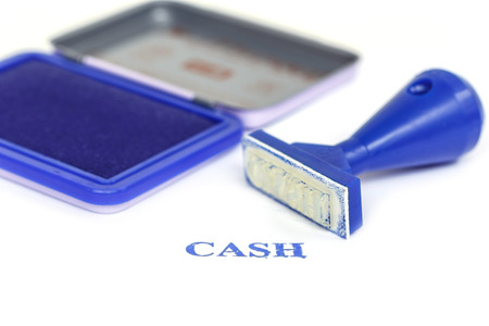 Cash letter on blue rubber stamp isolated on white backgroundの写真素材