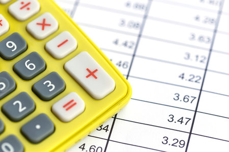 Close up calculator on paperの写真素材