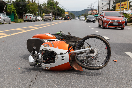 PHUKET, THAILAND - NOVEMBER 3 : Van accident on the road and crashed with motorcycle which causing the rider serious injury. November 3, 2014 in Phuket Thailand.のeditorial素材