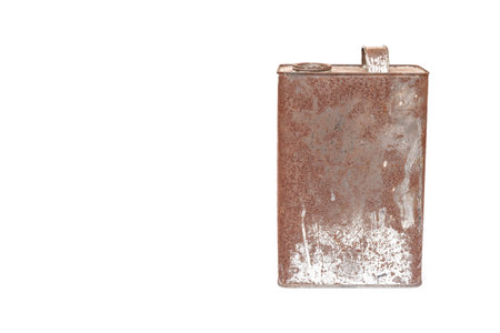 Rusty metal can isolated on white backgroundの写真素材