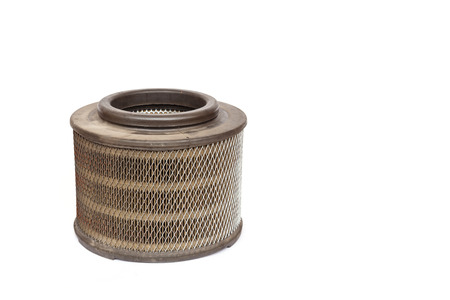 Old car air filter isolated on white background