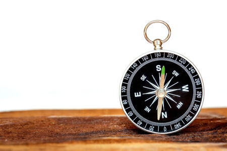 Close up compass on wood backgroundの写真素材