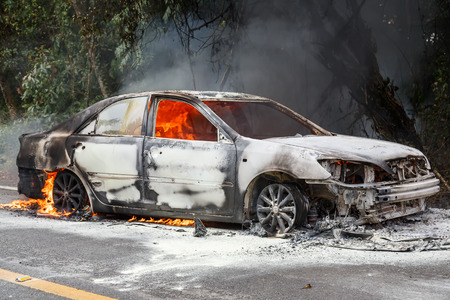 CHIANG MAI, THAILAND - JANUARY 1 : Car fire due to a gas explosion. While driving up to the hill. This makes all the damaged on car but driver is safe on January 1, 2015 in Chiang Mai, Thailand.のeditorial素材