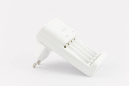 White battery Charger isolated on white backgroundの写真素材