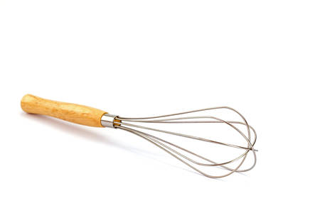 Manual hand egg beater mixer isolated on white backgroundの写真素材