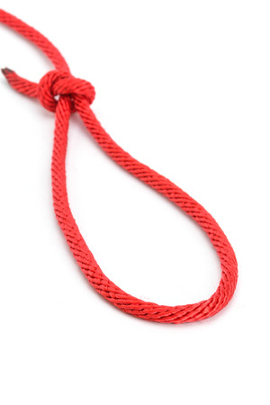 Red rope with knotted isolated on white background