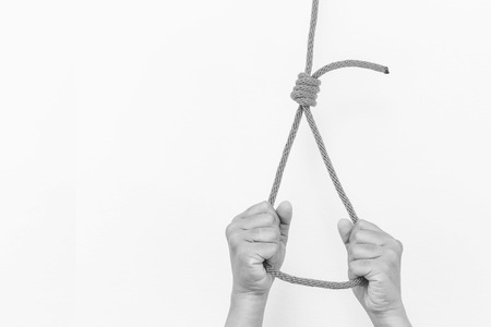 Hands holding rope slipknot in concept suicide, Black and white colorの写真素材