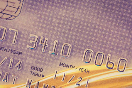 Close up credit card, with retro filter effectの写真素材