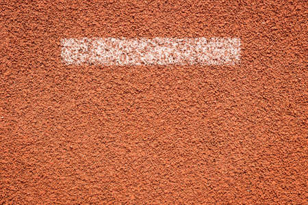 Running track with white stripe for athletics