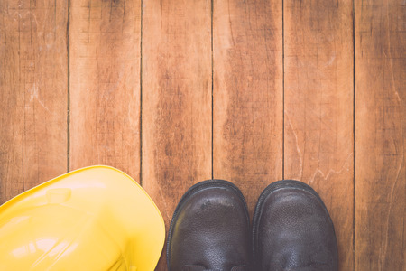 Close up of assorted work tools on wooden backgroundの写真素材